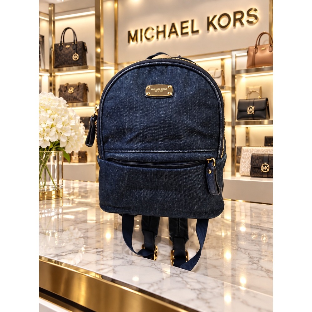 MK198 Michael Kors distressed denim backpack